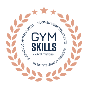 Gyms Skills hopeamitali. Keskellä on teksti GYM SKILLS ja sen alla slogan "Näytä taitosi". Tekstiä ympäröi pronssinen lehtiseppele.